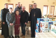 Milićki sveštenici podijelili božićne pečenice parohijanima